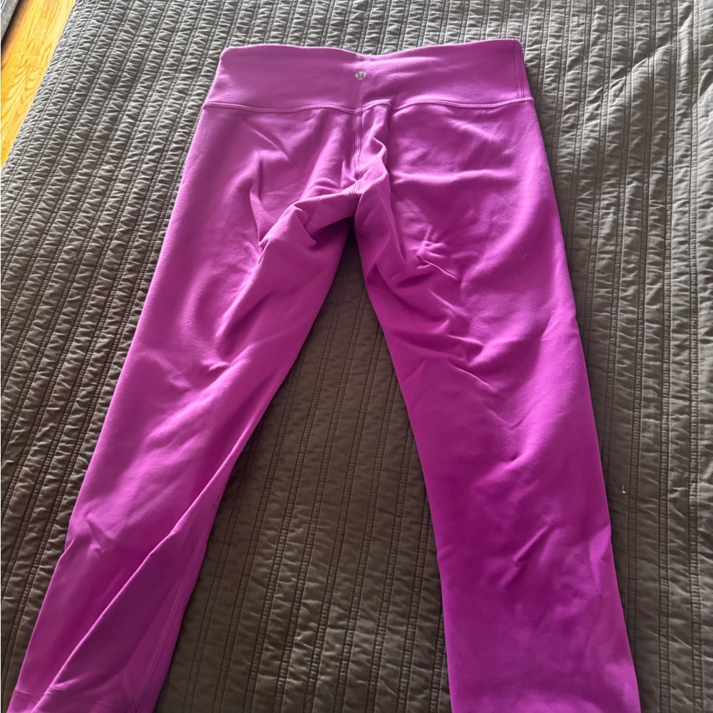Lululemon reversible Vibrant Purple Capri Leggings with Reflective Accents